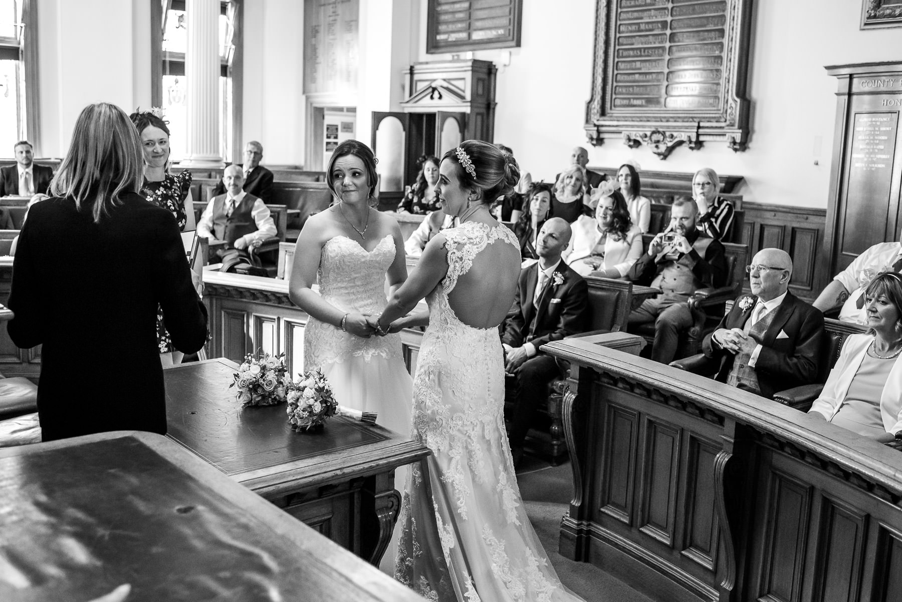 Same-sex couple getting married at the Brighton Town Hall