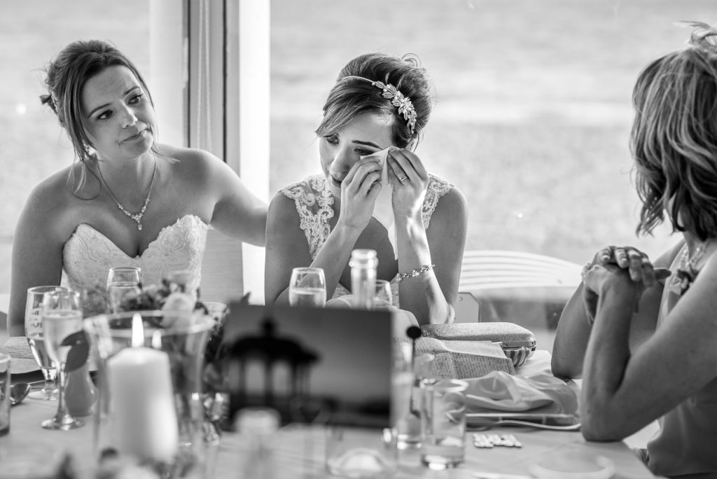 emotional moment for same-sex couple during wedding speeches