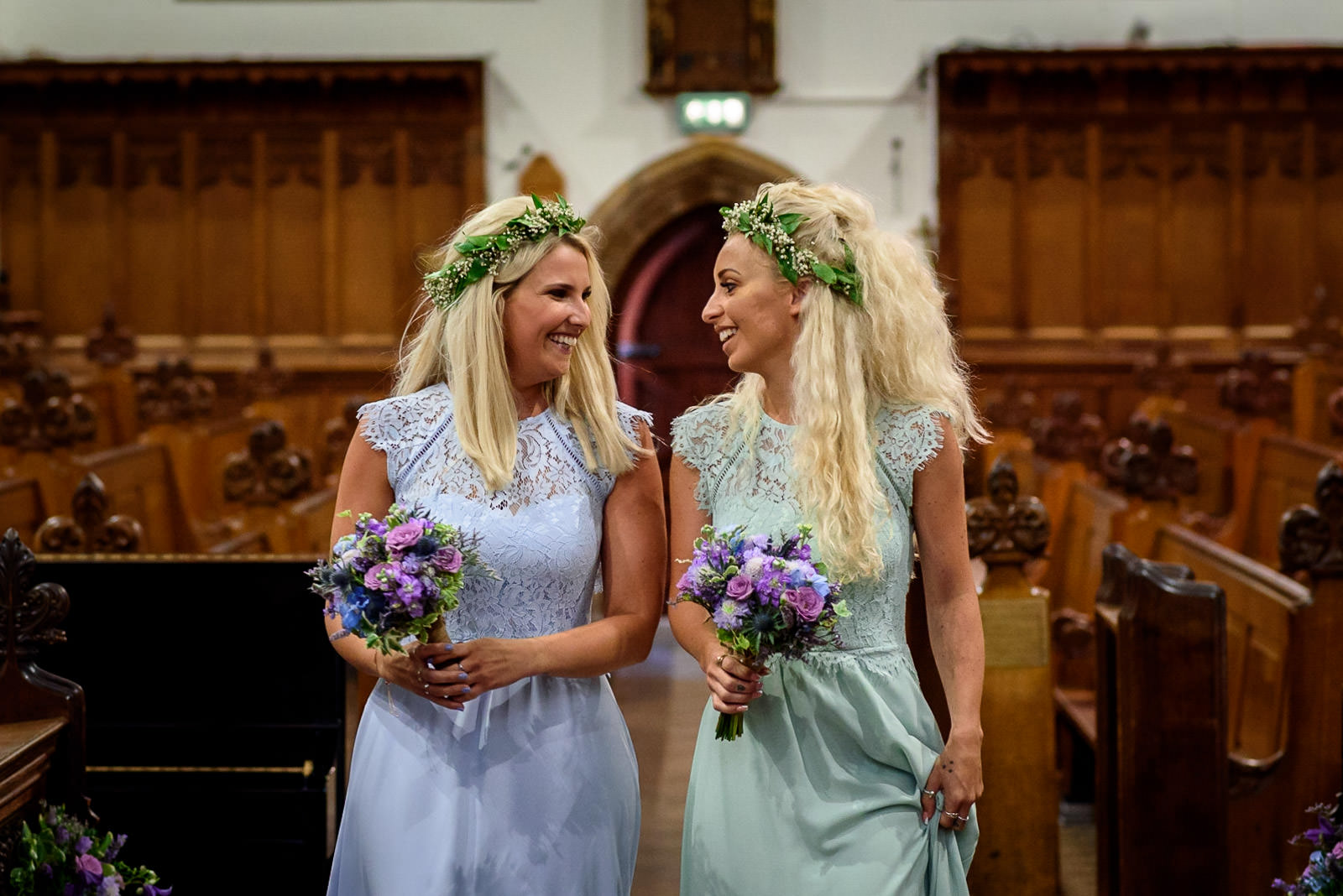 Bridesmaids walking down the aisle at Brighton College Wedding