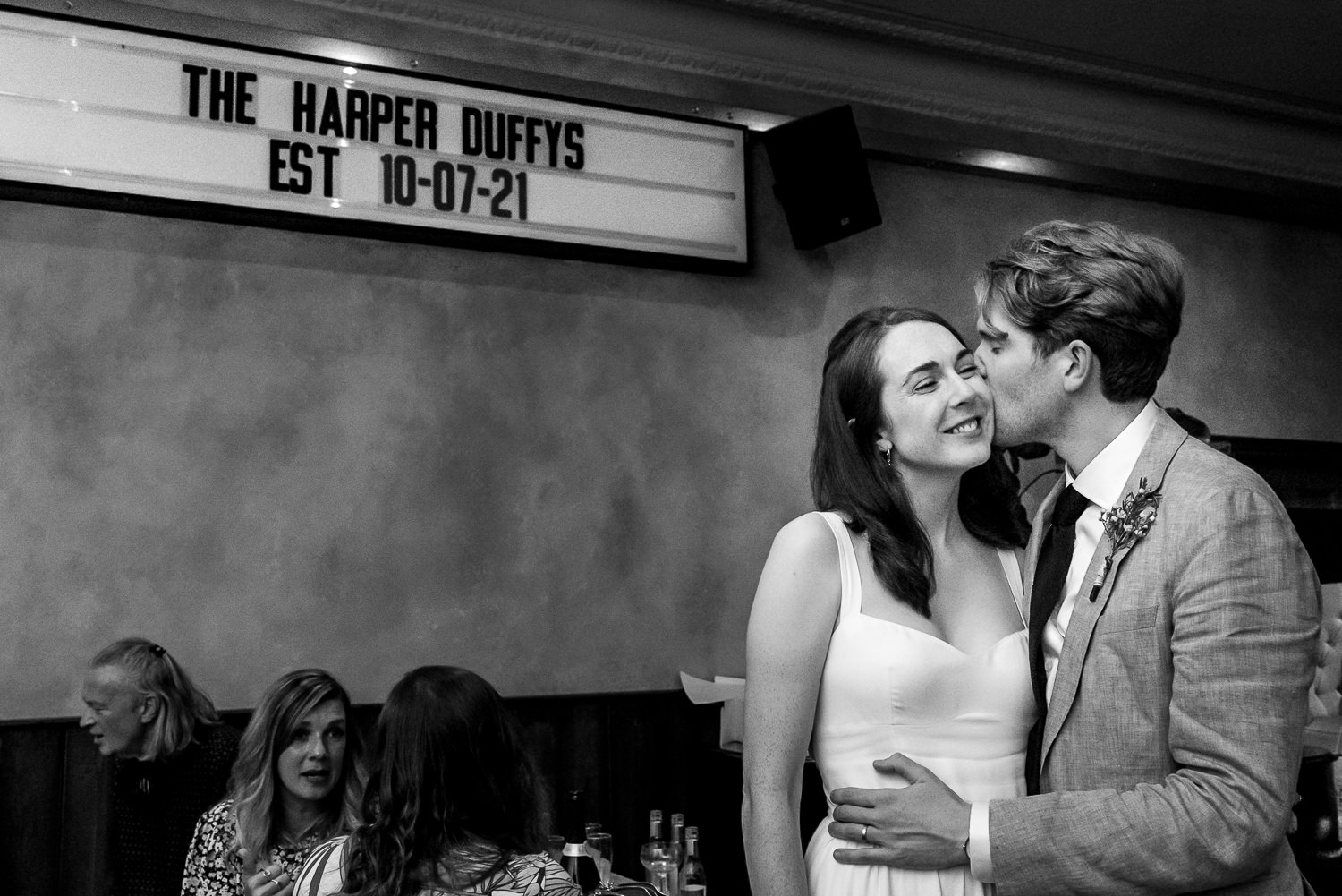 wedding couple kissing at The Joker in Brighton